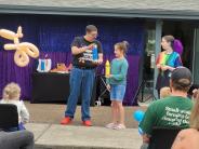 Magician, and young girl participant